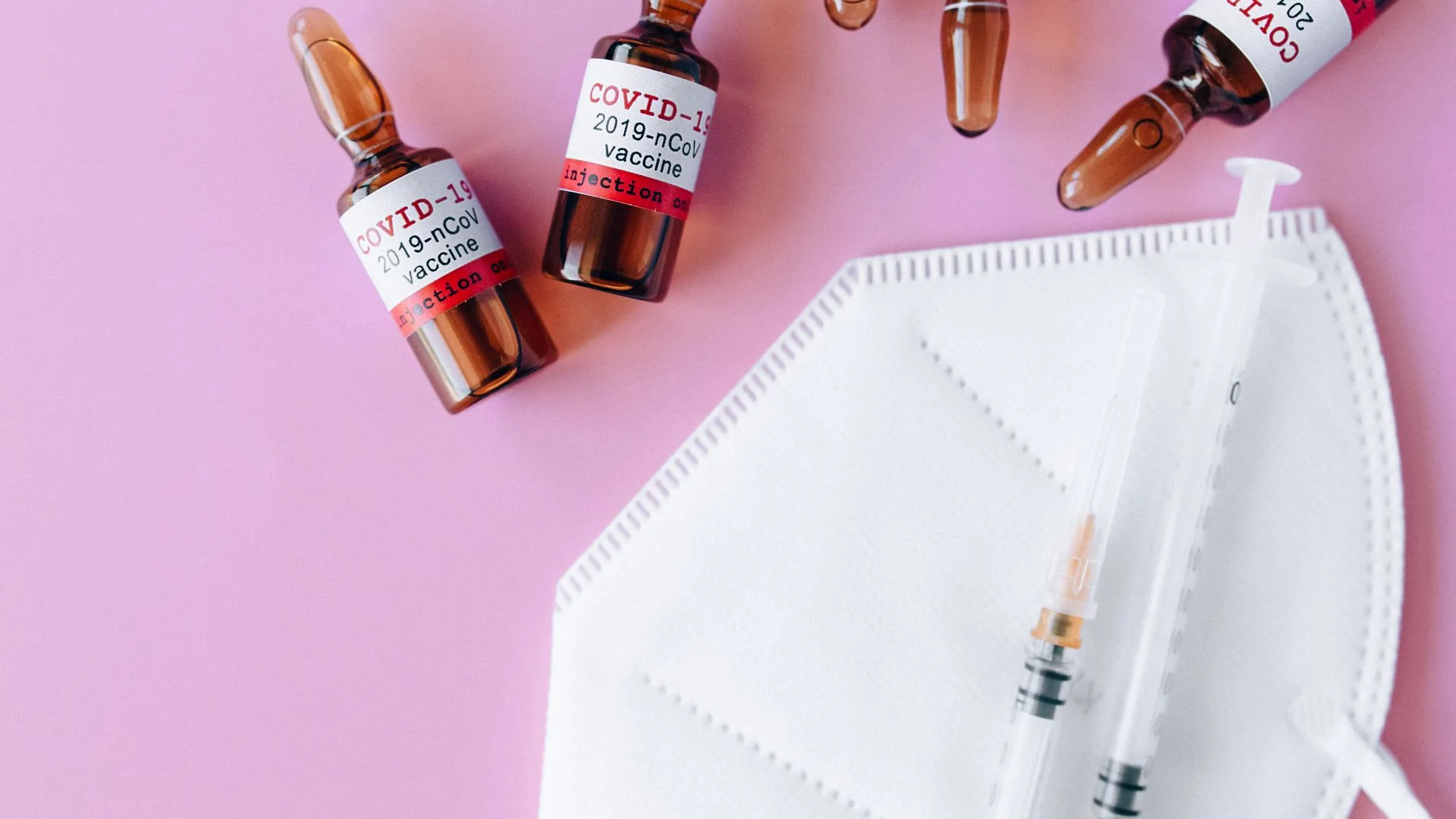 A vaccine vial and syringe.
